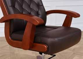 Elegancki fotel gabinetowe Consul tapicerowany skórą naturalną w kolorze brązowym, czarnym lub kremowym. Fotel ma drewnianą ramę i podłokietniki, mechanizm tilt, jest wygodne i solidnie wykonane.