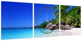 Obraz plaży na wyspie Praslin (z zegarem) (90x30 cm)