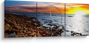 Obraz - Mewa lecąca nad wybrzeżem (z zegarem) (90x30 cm)