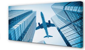 Obraz na płótnie Samolot nad Dachami Miasta