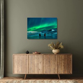 Obraz na szkle ludzi w pobliżu zorzy polarnej (70x50 cm)