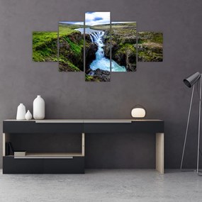 Obraz wodospadu między skałami (125x70 cm)