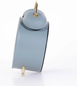 Zegarek budzik ze złotymi wskazówkami