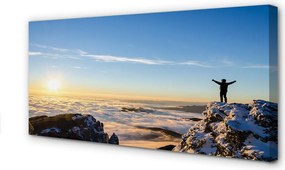 Obraz canvas na ścianę Człowiek w Górach o Wschodzie