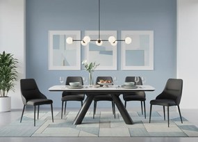 Elegancki stół z białym ceramicznym blatem na hartowanym szkle. Metalowa podstawa z czarnej stali nadaje mu nowoczesny charakter i wyjątkową trwałość.