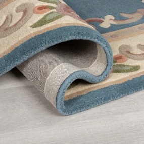 Niebieski wełniany dywan Flair Rugs Aubusson, 67x210 cm