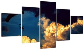 Obraz skoczka spadochronowego w chmurach (125x70 cm)