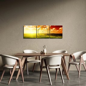 Obraz łąki ze świecącym słońcem (z zegarem) (90x30 cm)