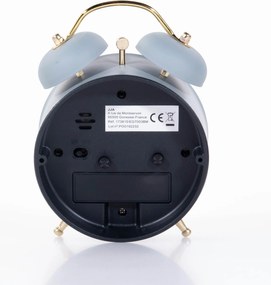 Zegarek budzik ze złotymi wskazówkami