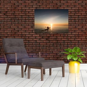 Obraz na szkle kajakarza o zachodzie słońca (70x50 cm)