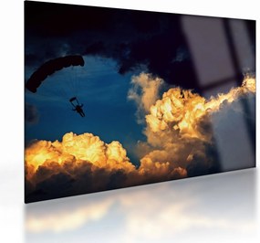 Obraz na szkle skoczka spadochronowego w chmurach (70x50 cm)