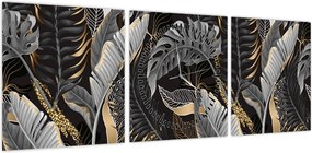 Obraz - Tropikalne liście w kolorze czarno - złotym (z zegarem) (90x30 cm)