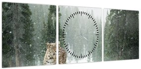 Obraz lamparta na śniegu (z zegarem) (90x30 cm)