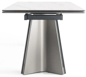 Nowoczesny stół rozkładany Nexus o wymiarach 200(280)×90 cm zachwyca eleganckim blatem z masy ceramicznej i solidną podstawą ze stali szczotkowanej. Styl, trwałość i funkcjonalność w jednym – idealny do jadalni i salonu.