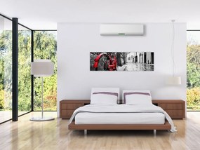 Obraz czerwonego roweru na brukowanej uliczce (170x50 cm)