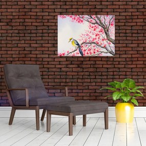 Obraz na szkle - ptak na drzewie z czerwonymi kwiatami (70x50 cm)