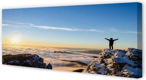 Obraz canvas na ścianę Człowiek w Górach o Wschodzie