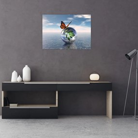 Obraz na szkle motyla na szklanej kuli (70x50 cm)