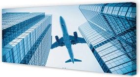 Obraz na płótnie Samolot nad Dachami Miasta