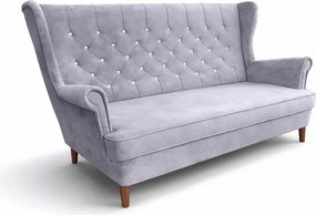 Nowoczesna sofa uszak z przeszyciami i pikowaniem po całości