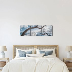 Obraz ośnieżonego drzewa nad wodą (z zegarem) (90x30 cm)