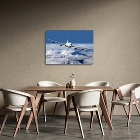 Obraz na szkle - Samolot w chmurach (70x50 cm)