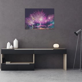 Obraz na szkle - nocne miasto z fajerwerkami (70x50 cm)