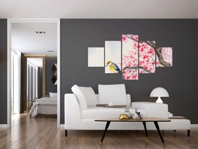 Obraz - ptak na drzewie z czerwonymi kwiatami (125x70 cm)
