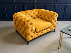 Stylowy fotel Chesterfield Moet z głębokim siedziskiem i pikowanym oparciem