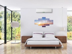 Obraz - Zachód słońca ponad chmurami (125x70 cm)