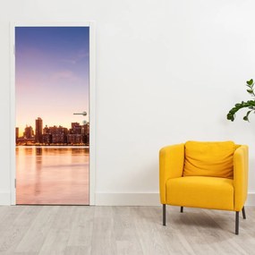 Fototapeta na drzwi - Miasto o zachodzie słońca (95x205cm)