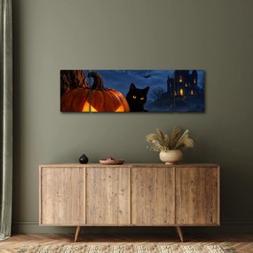 Obraz - Czarny kot przy świecącej dyni na Halloween (170x50 cm)
