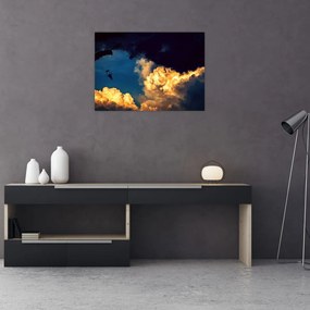 Obraz na szkle skoczka spadochronowego w chmurach (70x50 cm)