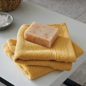 Żółte bawełniane ręczniki frotte zestaw 2 szt. 30x30 cm Zero Twist – Catherine Lansfield
