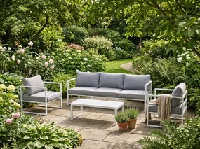 Komplet mebli ogrodowych (duża 3os. sofa, 2 x fotel + stolik) MOSTRARE białe aluminium, szare poduchy
