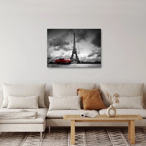 Obraz - Wieża Eiffla i czerwony samochód (70x50 cm)