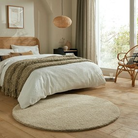 Beżowy okrągły dywan z włókien z recyklingu odpowiedni do prania 133x133 cm Fluffy – Flair Rugs