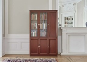 Klasyczna szafa do biura Elegance. Szafa ma górne drzwi częściowo przeszklone, dolne pełne, zamykane na kluczyk. Wymiary szafy 120x40x200 cm, kolor koniak, wykończona fornirem.