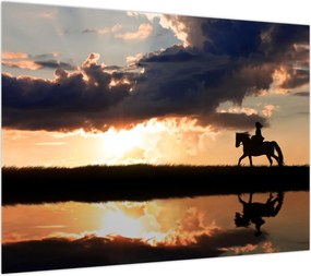 Obraz na szkle - Jeździec na koniu o zachodzie słońca (70x50 cm)