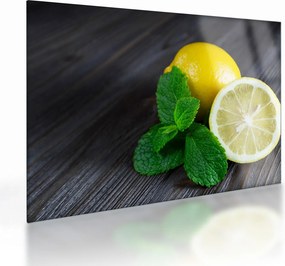 Obraz na szkle - cytryn i mięty na stole (70x50 cm)
