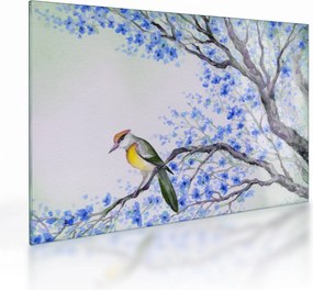 Obraz na szkle - ptak na drzewie z niebieskimi kwiatami (70x50 cm)