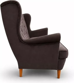 Nowoczesna sofa uszak z przeszyciami i pikowaniem po całości