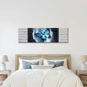 Obraz niebieskiego motyla na ścianie (170x50 cm)