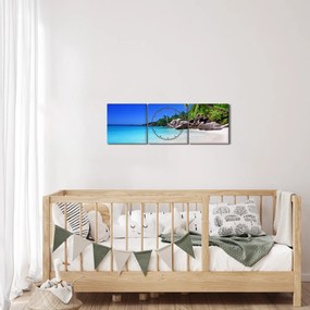 Obraz plaży na wyspie Praslin (z zegarem) (90x30 cm)