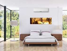 Obraz - słońce zachodzące za drzewami (170x50 cm)