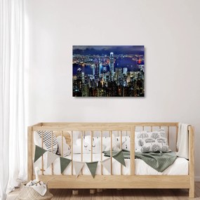 Obraz na szkle drapaczy chmur w nocy (70x50 cm)