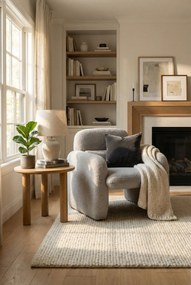 Szary fotel tapicerowany tkaniną boucle L9-W55