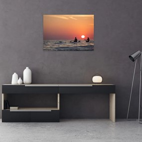 Obraz na szkle kajakarzy o zachodzie słońca (70x50 cm)