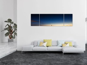 Obraz latarni morskiej w oddali (170x50 cm)